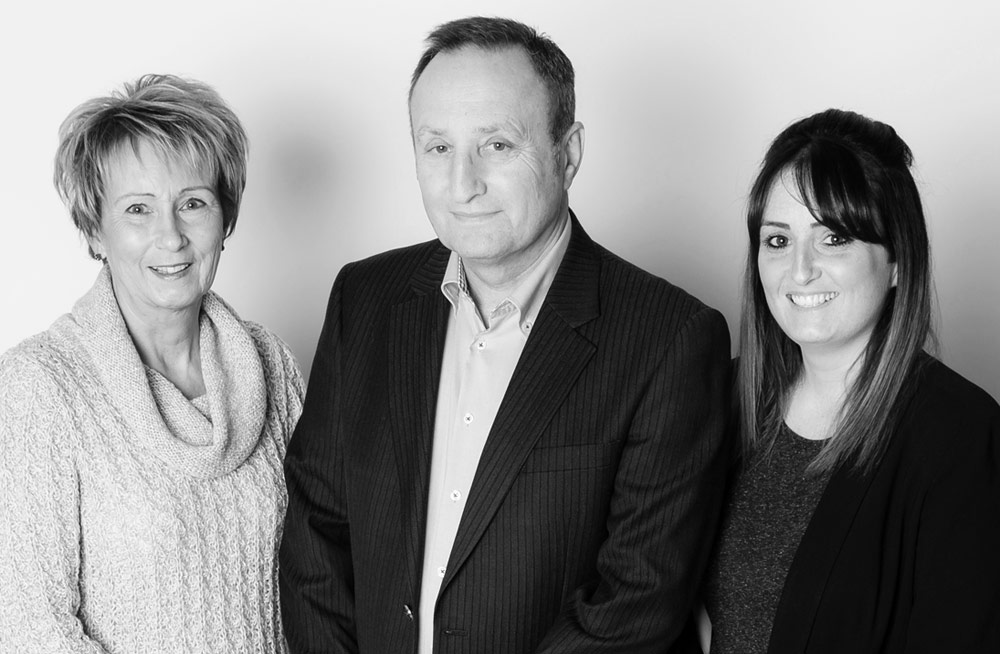 A photo of the Libra Office Interiors team: Paul, Barbara and Lauren Billig